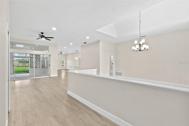 38 Kingsley Cir, Ormond Beach, FL 32174 - hall featuring a chandelier, baseboards, light wood-style floors, and recessed lighting