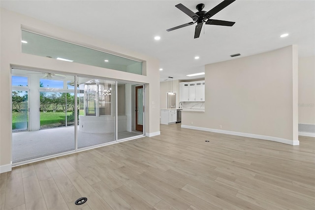 38 Kingsley Cir, Ormond Beach, FL 32174 - empty room featuring ceiling fan, recessed lighting, light wood finished floors, and baseboards