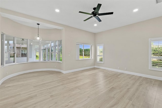 38 Kingsley Cir, Ormond Beach, FL 32174 - spare room featuring light wood-type flooring, baseboards, ceiling fan, and recessed lighting