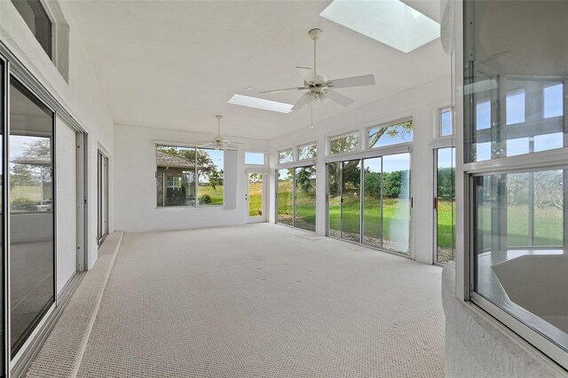 38 Kingsley Cir, Ormond Beach, FL 32174 - unfurnished sunroom with a skylight and carpet floors