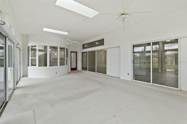 38 Kingsley Cir, Ormond Beach, FL 32174 - unfurnished sunroom featuring a skylight and healthy amount of natural light