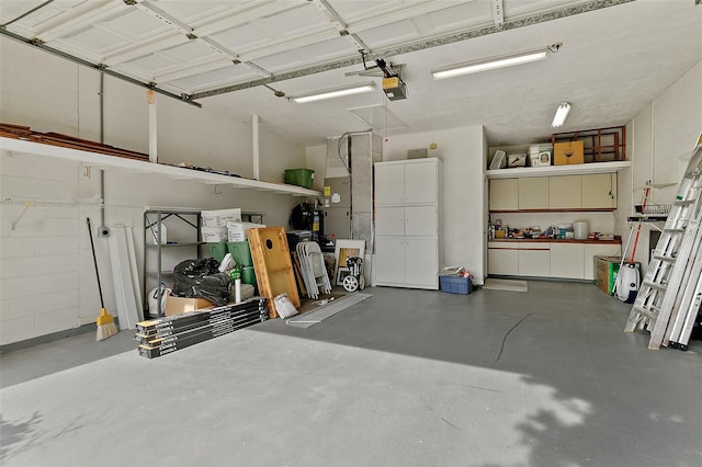 38 Kingsley Cir, Ormond Beach, FL 32174 - garage featuring a garage door opener