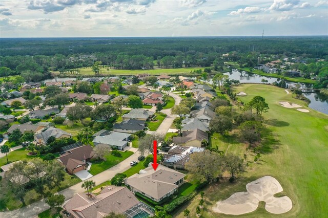 38 Kingsley Cir, Ormond Beach, FL 32174 - aerial view of property's location with nearby suburban area, a large body of water, and a golf course