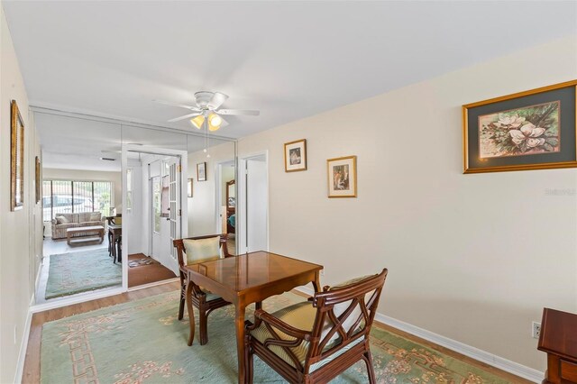 179 Frankford Ln, Palm Coast, FL 32137 - dining space featuring wood finished floors, ceiling fan, and baseboards