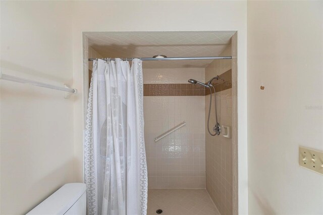 179 Frankford Ln, Palm Coast, FL 32137 - bathroom featuring a shower stall and toilet
