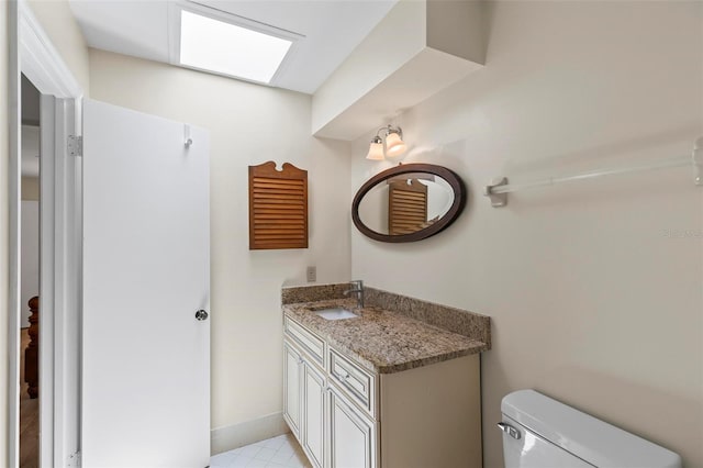 179 Frankford Ln, Palm Coast, FL 32137 - half bathroom featuring vanity, toilet, and baseboards
