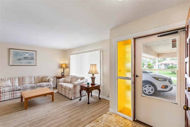 179 Frankford Ln, Palm Coast, FL 32137 - living room with light wood-style floors and baseboards