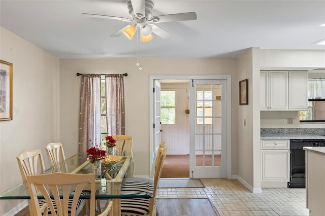 179 Frankford Ln, Palm Coast, FL 32137 - dining room with plenty of natural light, baseboards, ceiling fan, and brick floors