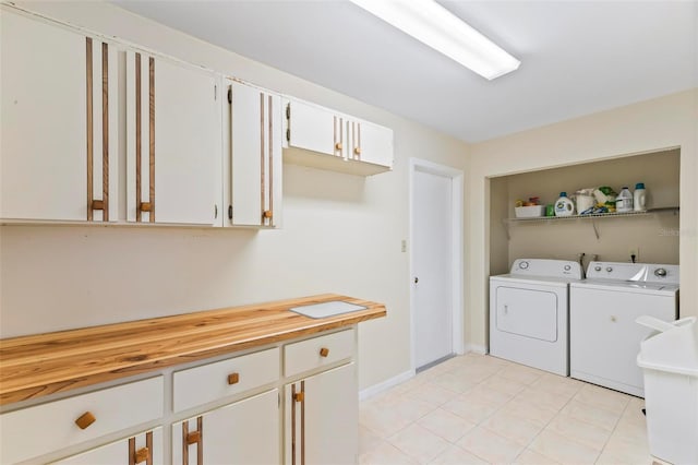 179 Frankford Ln, Palm Coast, FL 32137 - laundry area featuring washer and clothes dryer and light tile patterned flooring