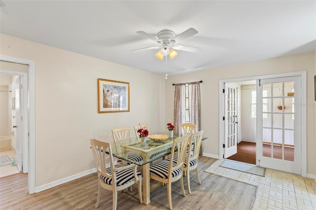 179 Frankford Ln, Palm Coast, FL 32137 - dining area with french doors, a ceiling fan, and baseboards