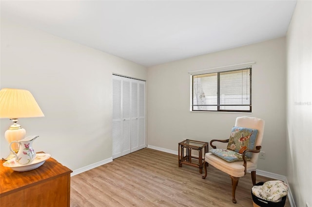 179 Frankford Ln, Palm Coast, FL 32137 - living area featuring baseboards and light wood-style flooring