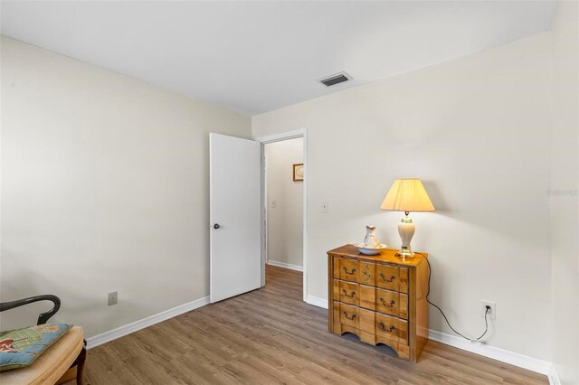 179 Frankford Ln, Palm Coast, FL 32137 - sitting room featuring wood finished floors and baseboards