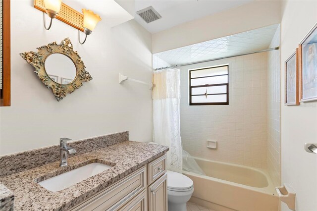 179 Frankford Ln, Palm Coast, FL 32137 - full bathroom with toilet, vanity, shower / tub combo, and tile patterned floors