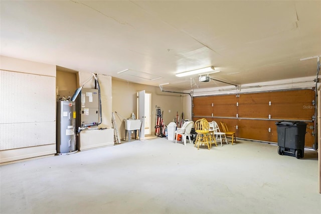 179 Frankford Ln, Palm Coast, FL 32137 - garage featuring electric water heater, heating unit, and a garage door opener