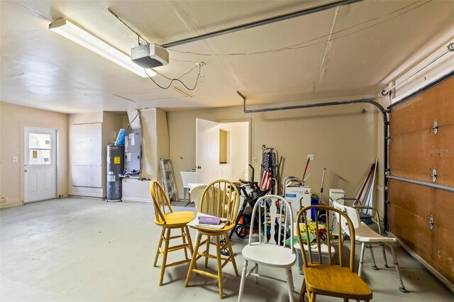 179 Frankford Ln, Palm Coast, FL 32137 - garage featuring water heater, a garage door opener, and heating unit