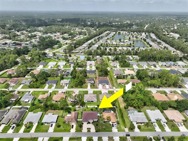 42 Raintree Pl, Palm Coast, FL 32164 - aerial view of property and surrounding area with nearby suburban area and a nearby body of water