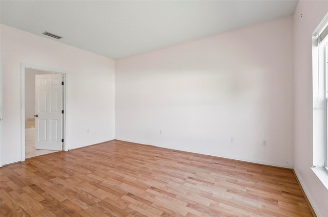 42 Raintree Pl, Palm Coast, FL 32164 - spare room featuring light wood-style flooring