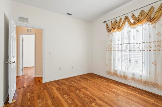 42 Raintree Pl, Palm Coast, FL 32164 - spare room with wood finished floors