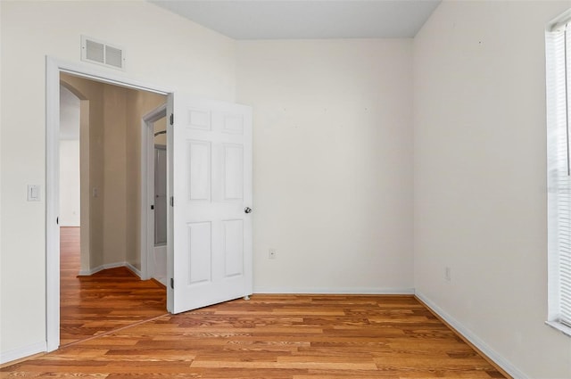 42 Raintree Pl, Palm Coast, FL 32164 - empty room with light wood-style floors and baseboards