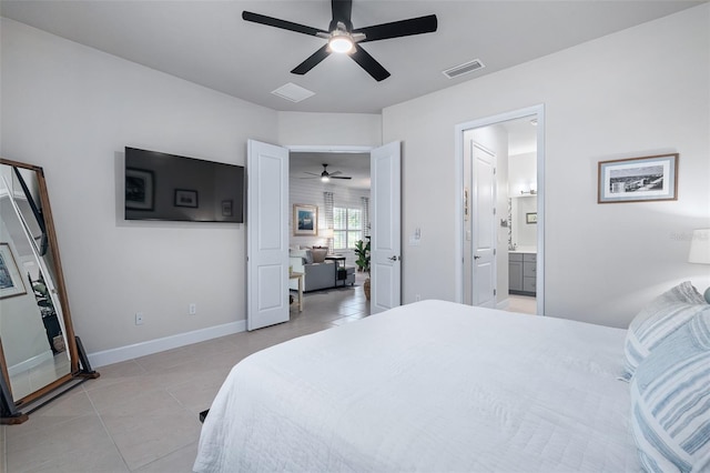 17 Newhaven Ln, Ormond Beach, FL 32174 - bedroom featuring light tile patterned flooring, ceiling fan, and ensuite bathroom