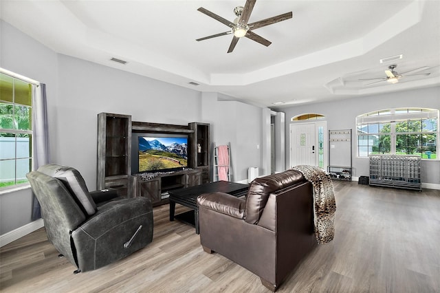 4 Seathorn Path, Palm Coast, FL 32164 - living area featuring ceiling fan, a raised ceiling, and wood finished floors