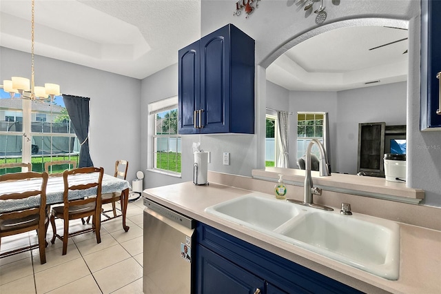 4 Seathorn Path, Palm Coast, FL 32164 - kitchen featuring a tray ceiling, blue cabinets, and stainless steel dishwasher