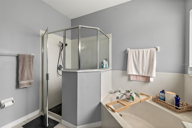 4 Seathorn Path, Palm Coast, FL 32164 - bathroom featuring a garden tub and a shower stall