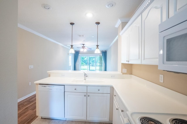 1400 Canopy Walk Ln Unit 1413, Palm Coast, FL 32137 - kitchen featuring white appliances, ornamental molding, a peninsula, ceiling fan, and hanging light fixtures