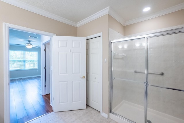 1400 Canopy Walk Ln Unit 1413, Palm Coast, FL 32137 - bathroom with a shower stall, ornamental molding, a ceiling fan, tile patterned floors, and recessed lighting