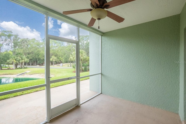 1400 Canopy Walk Ln Unit 1413, Palm Coast, FL 32137 - unfurnished sunroom with ceiling fan and plenty of natural light