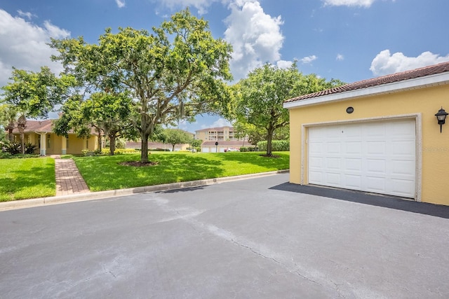 1400 Canopy Walk Ln Unit 1413, Palm Coast, FL 32137 - garage with driveway