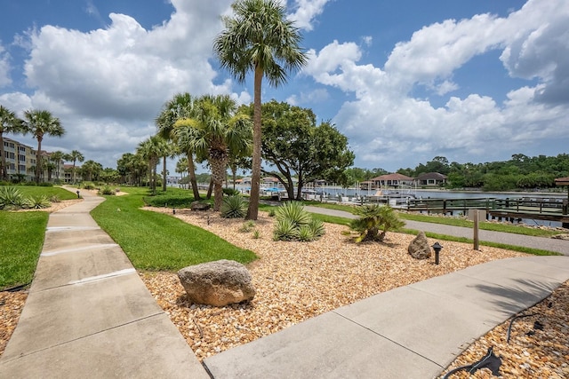 1400 Canopy Walk Ln Unit 1413, Palm Coast, FL 32137 - surrounding community featuring a water view and a yard