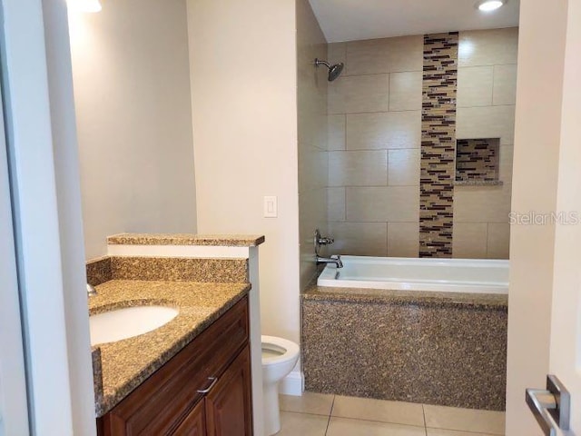 95 Rivers Edge Ln Unit 95, Palm Coast, FL 32137 - full bath featuring toilet, tile patterned flooring, tiled shower / bath combo, and vanity