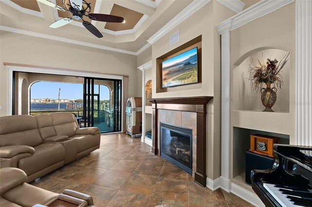 207 S Riverwalk Dr, Palm Coast, FL 32137 - living room featuring ceiling fan, ornamental molding, a fireplace, and coffered ceiling