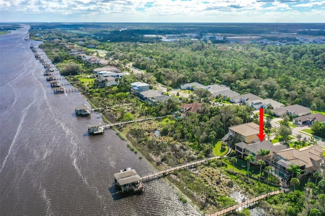 207 S Riverwalk Dr, Palm Coast, FL 32137 - aerial perspective of suburban area featuring a large body of water