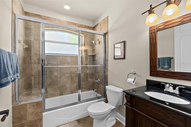 207 S Riverwalk Dr, Palm Coast, FL 32137 - full bathroom with vanity and enclosed tub / shower combo