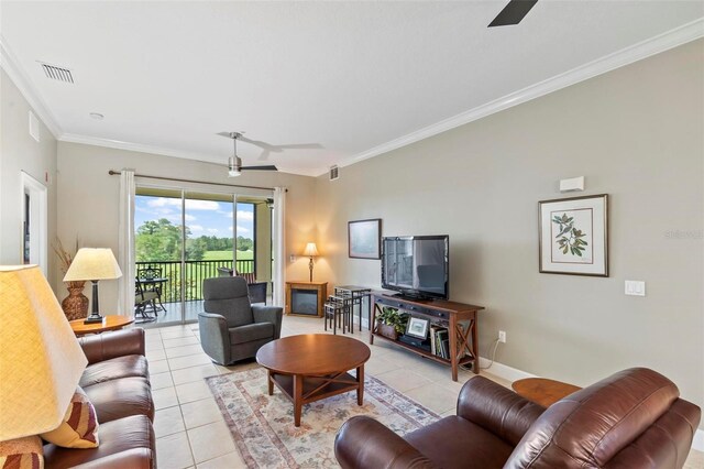 200 Riverfront Dr Unit D302, Palm Coast, FL 32137 - living area with light tile patterned floors, ornamental molding, and ceiling fan