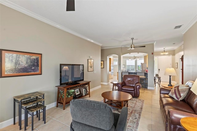 200 Riverfront Dr Unit D302, Palm Coast, FL 32137 - living room with a ceiling fan, arched walkways, light tile patterned floors, and ornamental molding