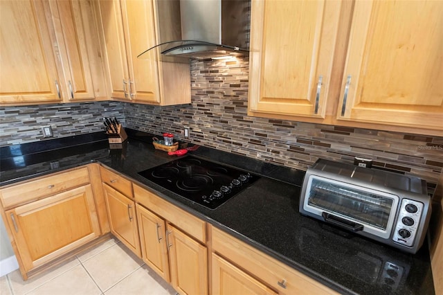 200 Riverfront Dr Unit D302, Palm Coast, FL 32137 - kitchen with extractor fan, black electric cooktop, backsplash, light tile patterned flooring, and light brown cabinetry