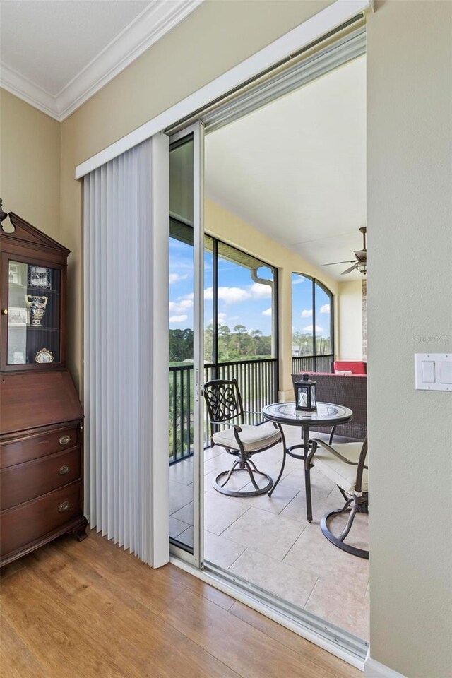 200 Riverfront Dr Unit D302, Palm Coast, FL 32137 - interior space featuring ceiling fan, wood finished floors, and crown molding