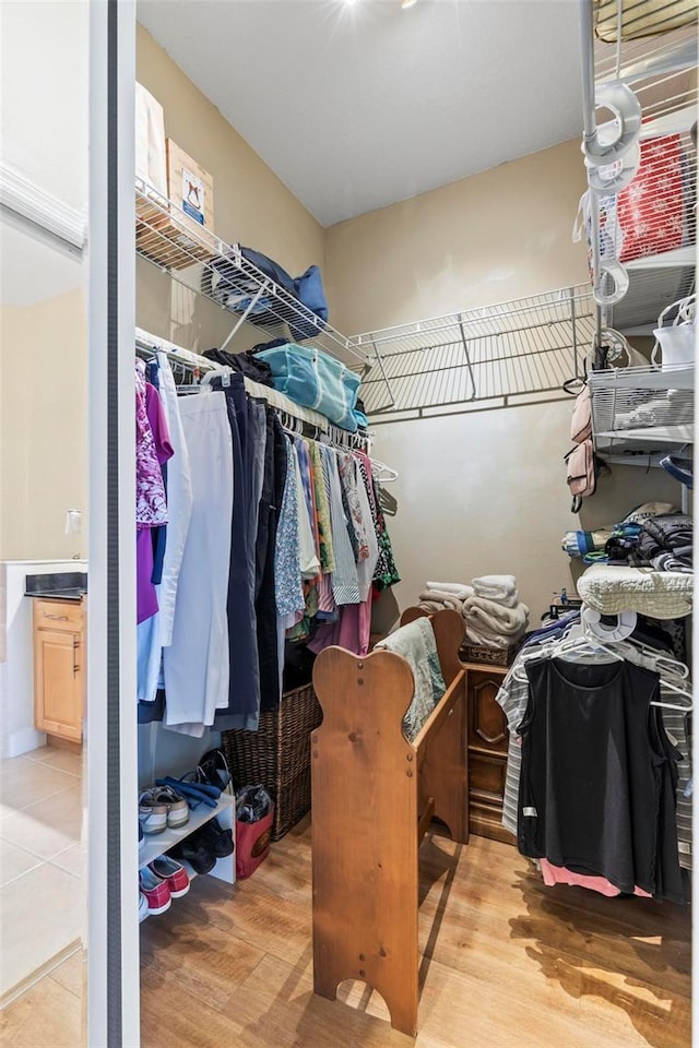 200 Riverfront Dr Unit D302, Palm Coast, FL 32137 - walk in closet with wood finished floors