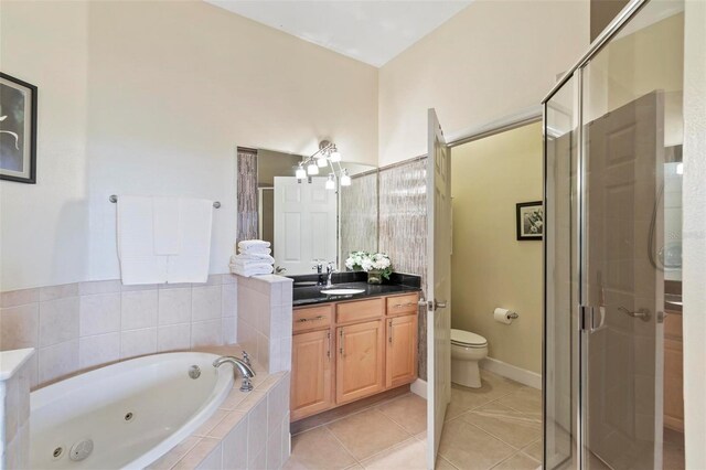 200 Riverfront Dr Unit D302, Palm Coast, FL 32137 - full bath with a tub with jets, vanity, a shower stall, and tile patterned floors