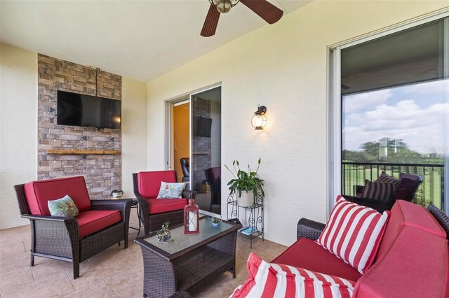 200 Riverfront Dr Unit D302, Palm Coast, FL 32137 - view of patio featuring outdoor lounge area and a ceiling fan