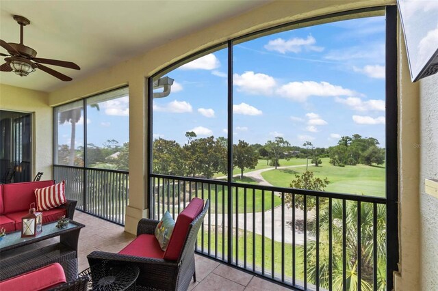 200 Riverfront Dr Unit D302, Palm Coast, FL 32137 - sunroom featuring a ceiling fan, golf course view, outdoor lounge area, and tile patterned floors