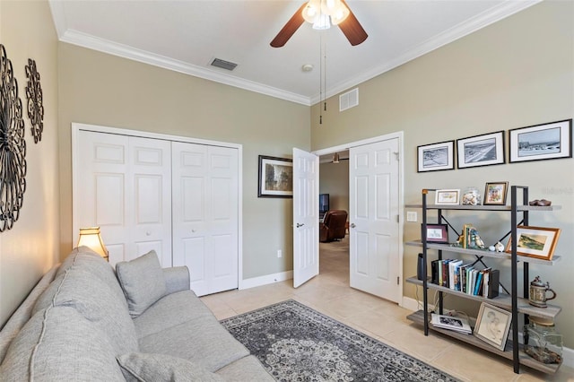 200 Riverfront Dr Unit D302, Palm Coast, FL 32137 - living area featuring tile patterned flooring, crown molding, and ceiling fan