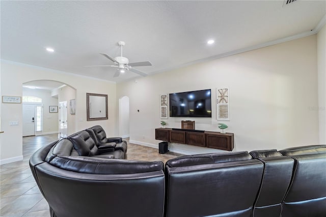 265 Pinehurst Pointe Dr, Saint Augustine, FL 32092 - living area with arched walkways, a ceiling fan, ornamental molding, light tile patterned floors, and recessed lighting
