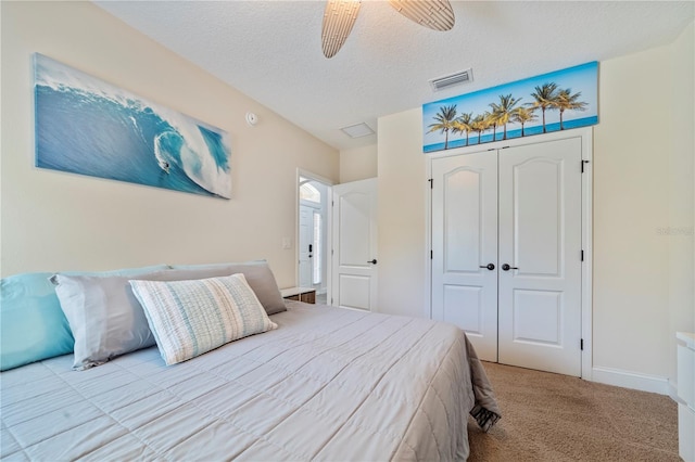 265 Pinehurst Pointe Dr, Saint Augustine, FL 32092 - carpeted bedroom featuring a textured ceiling, a closet, and ceiling fan