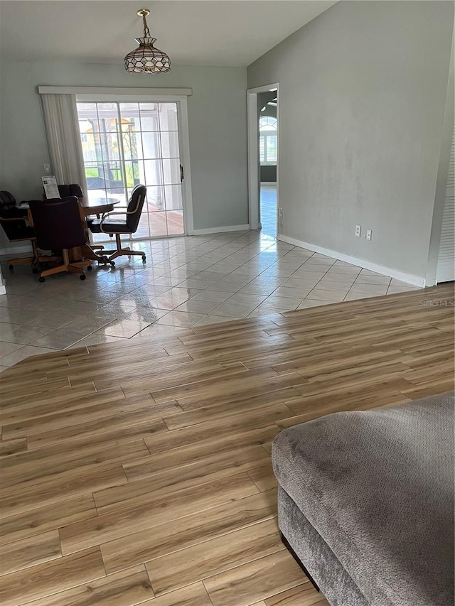 250 Beechwood Ln, Palm Coast, FL 32137 - dining space featuring light wood-style flooring, an office area, and lofted ceiling