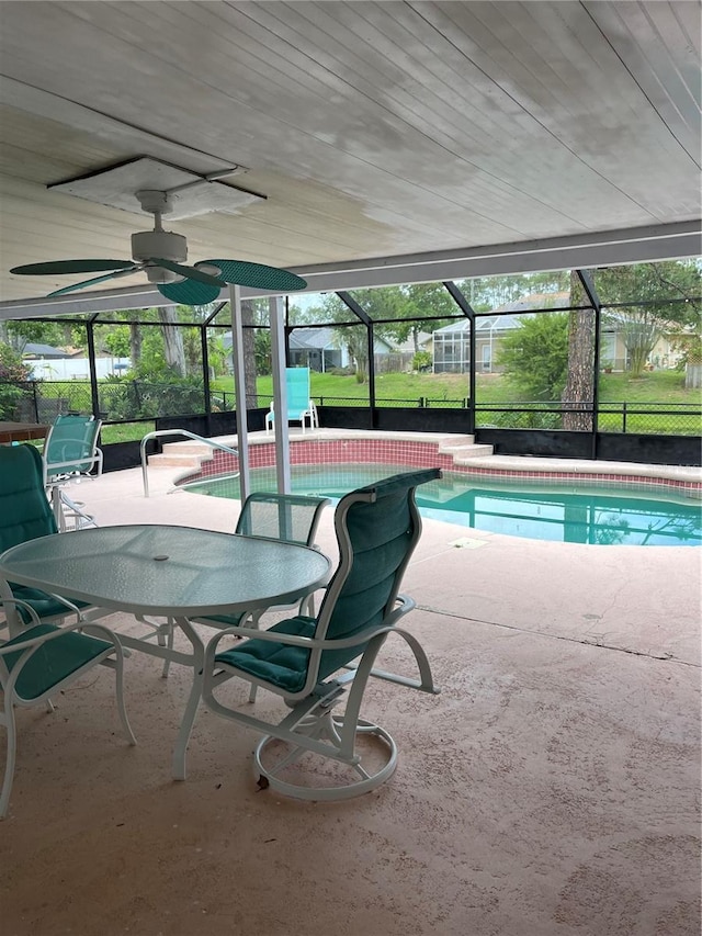 250 Beechwood Ln, Palm Coast, FL 32137 - outdoor pool with ceiling fan, a patio, and a lanai