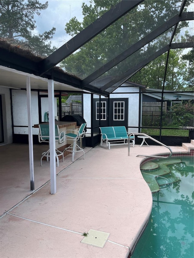 250 Beechwood Ln, Palm Coast, FL 32137 - swimming pool with a patio, a lanai, and a storage shed